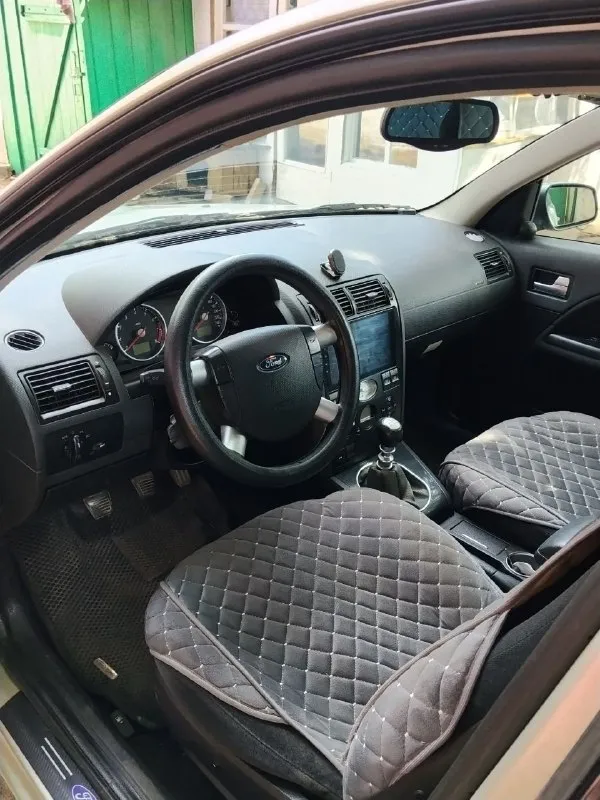 Продам ford mondeo 3, 2001 года выпуска, в хорошем рабочем состоянии. в одной семье с 2012 года. по документам владелец я. г. торез. комплектация ghia, пробег 325 000 км. двигатель 2.0 л (145 л. с. ). 4 стеклоподъёмника, abs, круиз-контроль, обогрев заднего и бокового стекла, подогрев передних сидений, комплект зимней резины на дисках, 2 din магнитола, парктроники. дополнительно: отдам с машиной 4 двери, крышку багажника, двигатель, кпп и ещё много запчастей по автомобилю. цена: 300 тыс. небольшой торг. по всем вопросам обращайтесь в лс или по номеру +79493665763 📞 звоните: +7(949)3665763 - фотография - 9