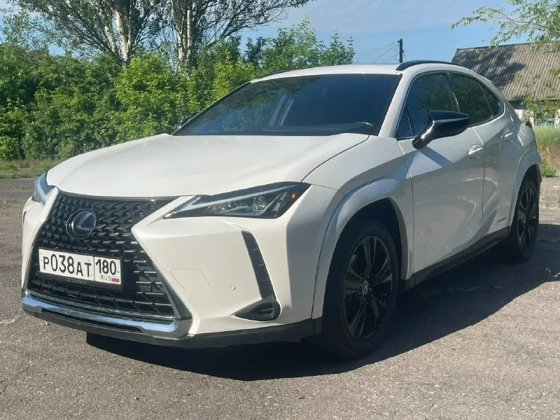 ▎общие характеристики: • модель: lexus ux 250h • год выпуска: 2021 • тип кузова: кроссовер • цвет: белый жемчуг- перломутр ▎двигатель и производительность: • тип двигателя: гибридный (бензиновый + электрический) • объем двигателя: 2.0 литра (4-цилиндровый) • мощность: 178 л. с. (131 квт) • крутящий момент: около 192 нм • трансмиссия: электическая вариаторная трансмиссия (ecvt) • привод: полный привод ▎размеры и вес: • длина: около 4495 мм • ширина: около 1840 мм • высота: около 1540 мм • колесная база: 2640 мм • снаряженная масса: примерно 1600-1700 кг (в зависимости от комплектации) ▎топливная эффективность: • расход топлива в городе: около 5.5 - 6.0 л/100 км • расход топлива на шоссе: около 5.0 - 5.5 л/100 км • смешанный расход топлива: около 5.3 - 5.8 л/100 км • объем топливного бака: 43 литра ▎характеристики интерьера и комфорта: • количество мест: 5 • климат-контроль: двухзонный • мультимедиа система: lexus multimedia с поддержкой apple carplay и android auto • ауди 📞 звоните: +7(949)3415172 - фотография - 2