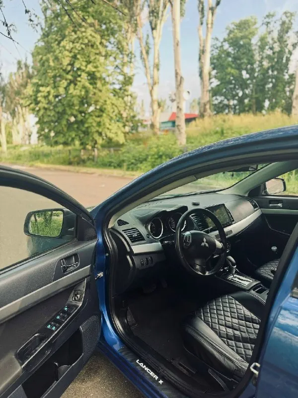 Продам mitsubishi lancer x 2011 года выпуска, двигатель 1.5 (109 л. с. ).650.000 торг у капота рассмотрю обмен донецк пробег: 250 000 км.4владельца автомобиль на ходу, обслуживался своевременно. недавно выполнены работы по обслуживанию и замене ряда деталей: заменены масла и фильтры;двигатель/коробка правый рычаг подвески; левый сайлентблок; радиатор кондиционера; ремень грм; левая шаровая опора; установлены новые газлифты капота и багажника; установлены новые задние фонари. в комплекте 2 комплекта резины на дисках (лето/зима). автомобиль полностью готов к эксплуатации. осмотр по договорённости. +79499796144 📞 звоните: +7(949)9796144 - фотография - 5