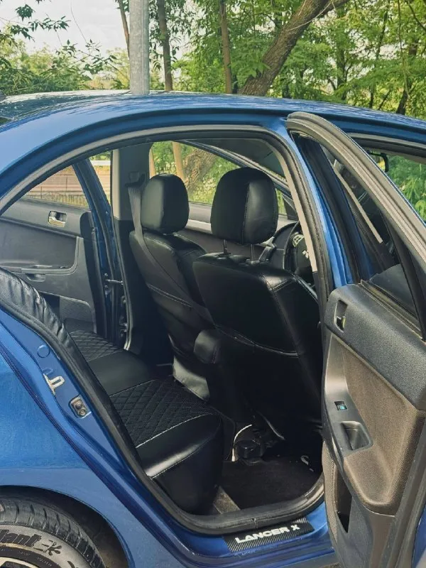 Продам mitsubishi lancer x 2011 года выпуска, двигатель 1.5 (109 л. с. ).650.000 торг у капота рассмотрю обмен донецк пробег: 250 000 км.4владельца автомобиль на ходу, обслуживался своевременно. недавно выполнены работы по обслуживанию и замене ряда деталей: заменены масла и фильтры;двигатель/коробка правый рычаг подвески; левый сайлентблок; радиатор кондиционера; ремень грм; левая шаровая опора; установлены новые газлифты капота и багажника; установлены новые задние фонари. в комплекте 2 комплекта резины на дисках (лето/зима). автомобиль полностью готов к эксплуатации. осмотр по договорённости. +79499796144 📞 звоните: +7(949)9796144 - фотография - 6
