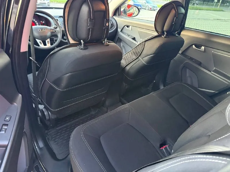 Продам kia sportage 2.0 бензин год выпуска 2012 состояние идеальное. без вмятин царапин и рыжиков сервисные книги. 2 ключа в родном окрасе вложений не требует! любое оформление! салон не затертый не порваный авто полностью обслужена до мелочей работает ровно. коробка переключает идеально климат контроль работает все жидкости заменены! стекла все родные каждая кнопка работает) цена 1.215₽ +7-949-794-46-27 остольные вопросы по телефону звоните в любое время. 📲 tg: евгений 📞 звоните: +7(949)7944627 - фотография - 7